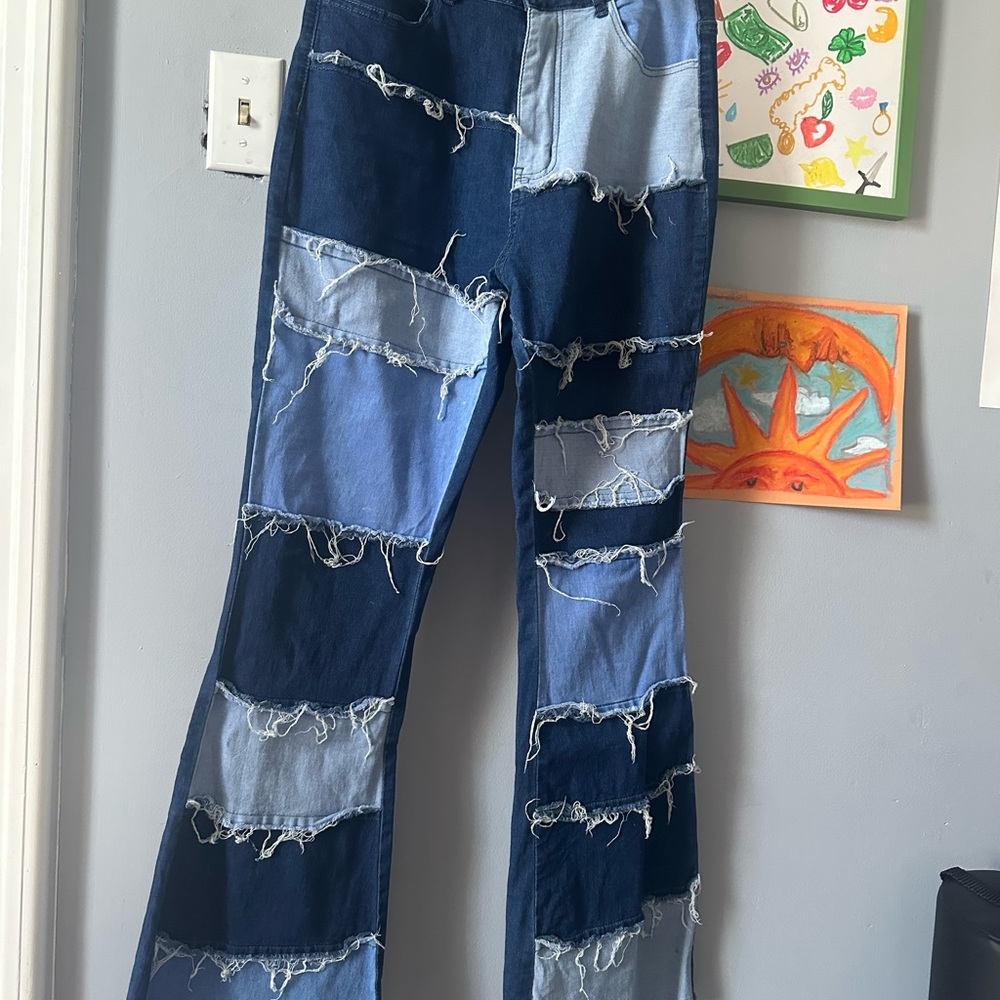 Woman’s Large Distressed Patchwork Blue Jeans - image 1